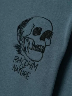 Sweat en coton biologique bleu chiné avec un col rond et une tête de mort brodée