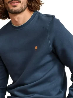 Sweat bleu uni avec une coupe droite et des manches longues