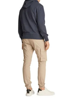 Sweat à capuche en coton bleu marine uni à coupe droite avec un petit patch