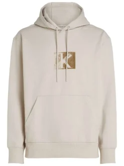 Sweat à capuche en coton écru uni avec une coupe droite et une grande poche