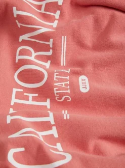 Sweat corail en coton coupe cropped col rond et manches longues avec logo université