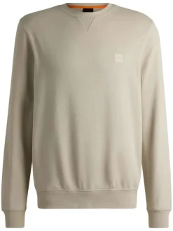 Sweat en coton beige uni avec une coupe regular fit et un patch à la poitrine