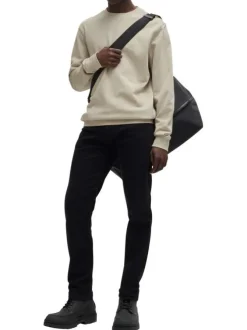 Sweat en coton beige uni avec une coupe regular fit et un patch à la poitrine