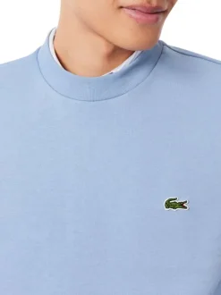 Sweat en coton mélangé bleu à coupe ajustée pourvu d'un col rond