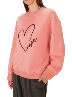 Sweat en coton mélangé rose imprimé avec une coupe ample et un col rond
