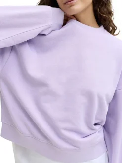 Sweat en coton violet pourvu d'un col rond et de manches longues