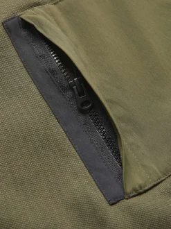 Sweat kaki uni à coupe droite et à col rond avec une poche zippée à la poitrine