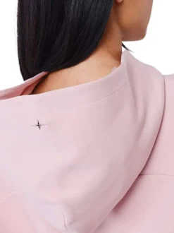 Sweat rose uni avec une coupe cropped à capuche et à manches longues