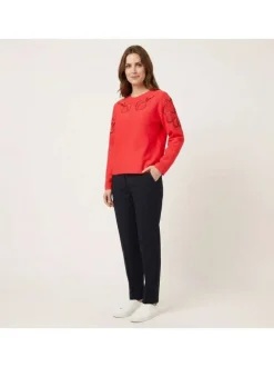 Sweat rouge uni pourvu de détails en maille ajourée et d'un col rond