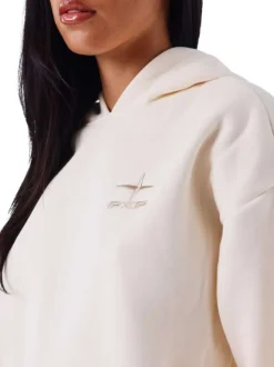 Sweat-shirt écru uni à poche kangourou avec un col à capuche