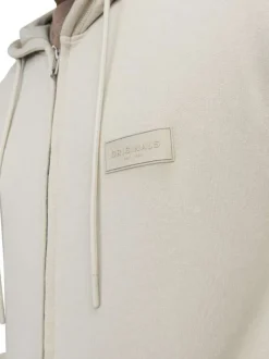 Sweat zippé en coton beige unie coupe droite avec un col à capuche