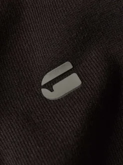 Sweat zippé en coton noir uni avec une coupe droite et un col montant