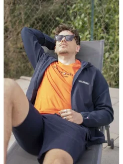 Sweat zippé marine uni avec une coupe droite et une capuche ajustable