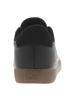 Tennis en cuir noires avec un talon plat et fermeture à lacets
