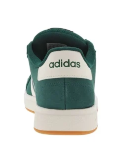 Tennis en cuir vertes à semelle écrue et maron avec lacets plats et logo blanc