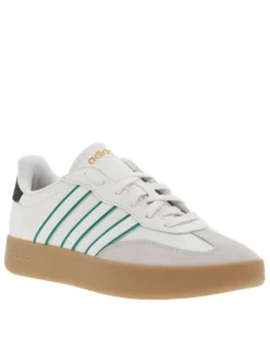 Tennis blanches et vertes en cuir à semelle marron avec logo jaune et lacets