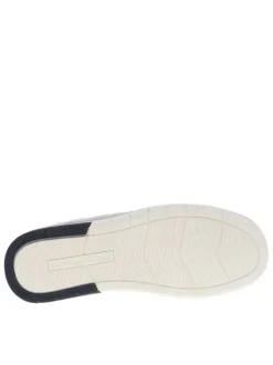 Tennis blanches à talon plat avec des lacets et un zip latéral