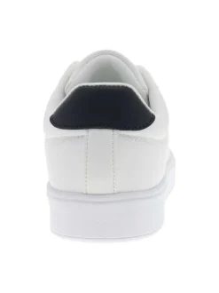 Tennis blanches à talon plat avec un logo embossé sur la languette