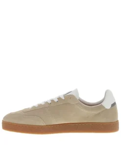 Tennis en cuir beiges à talon plat avec des lacets et revêtement doux