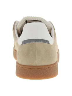 Tennis en cuir beiges à talon plat avec des lacets et revêtement doux