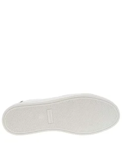 Tennis en cuir blanches avec des détails en daim verts sauge à semelle plate