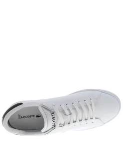 Tennis en cuir blanches avec le logo brodé et le talon noir et à lacets plats