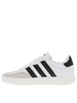 Tennis en cuir blanches avec semelle à talon plat et fermeture à lacets
