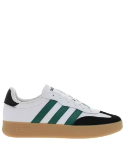 Tennis en cuir blanches avec semelle à talon plat et à lacets