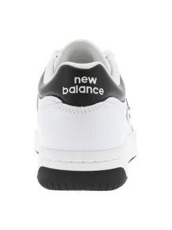 Tennis en cuir blanches avec talon plat et logos de la marque