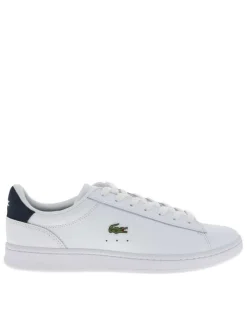 Tennis en cuir blanches et bleues avec un talon plat et des lacets