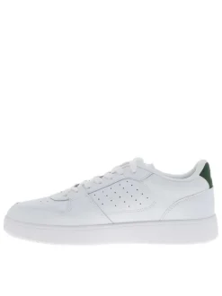 Tennis en cuir blanches et vertes avec un talon plat et des lacets