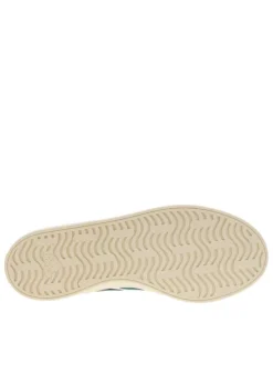 Tennis en cuir blanches et vertes à semelle écrue avec lacets plats verts
