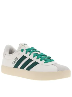 Tennis en cuir blanches et vertes à semelle écrue avec lacets plats verts