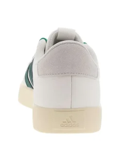 Tennis en cuir blanches et vertes à semelle écrue avec lacets plats verts