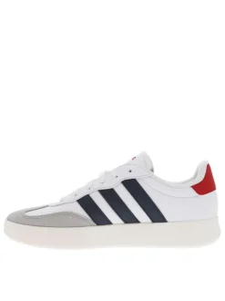 Tennis en cuir blanches à semelle écrue avec logo bleu et rouge