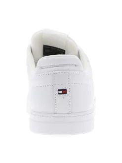 Tennis en cuir blanc à talon plat avec des lacets et un logo brodé