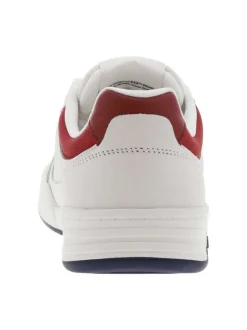 Tennis en cuir blanc à talon plat et à lacets plats blancs avec trous d'aération