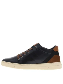 Tennis en cuir bleu marine avec une fermeture zippée et des lacets