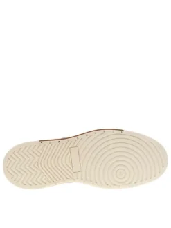 Tennis en cuir bleu marine avec une fermeture zippée et des lacets