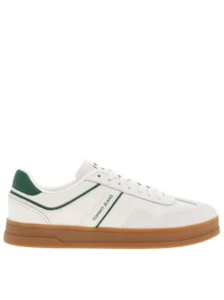 Tennis en cuir écrues avec des détails verts à semelle plate et à lacets plats