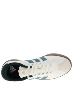 Tennis en cuir écrues avec semelle à talon plat et lacets ton sur ton