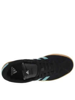 Tennis en cuir noires avec un talon plat et fermeture à lacets