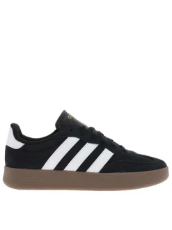 Tennis noires en croûte de cuir avec semelle à talon plat et à lacets