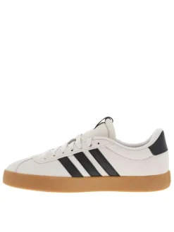 Tennis noires et beiges à talon plat avec des lacets blancs larges