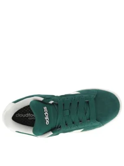 Tennis vertes et blanches à talon plat avec des lacets larges
