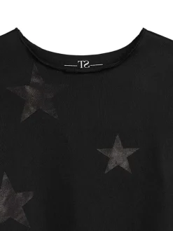 Top noir à motifs étoilés et à col rond avec des manches longues en resille