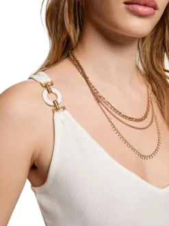 Top blanc chic uni pourvu d'une coupe droite et d'un col en V