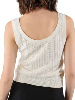 Top blanc uni avec une coupe droite un col rond et sans manches