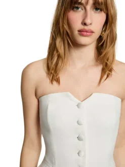 Top blanc uni chic pourvu d’une coupe droite et d’un col en V