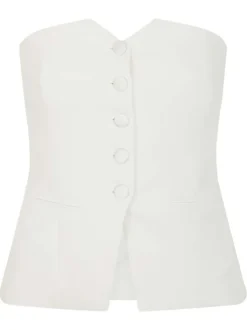 Top blanc uni chic pourvu d’une coupe droite et d’un col en V